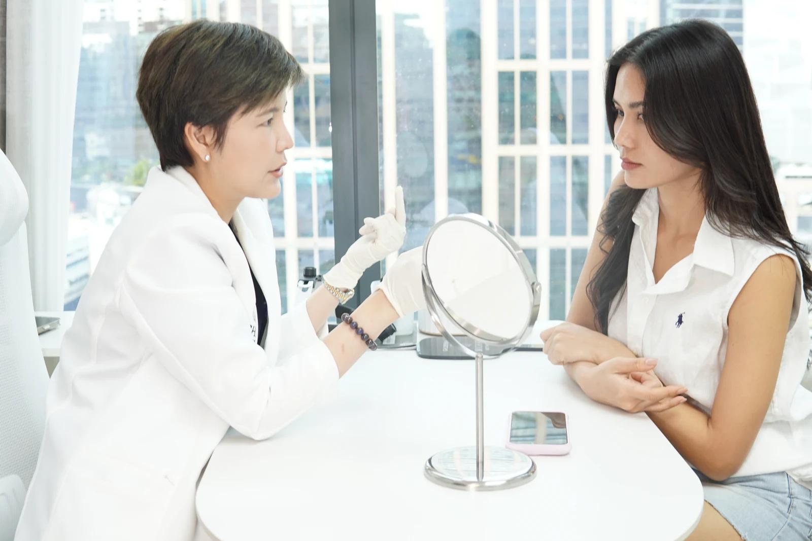 A MICHIKO doctor discussing an individual facial assessment